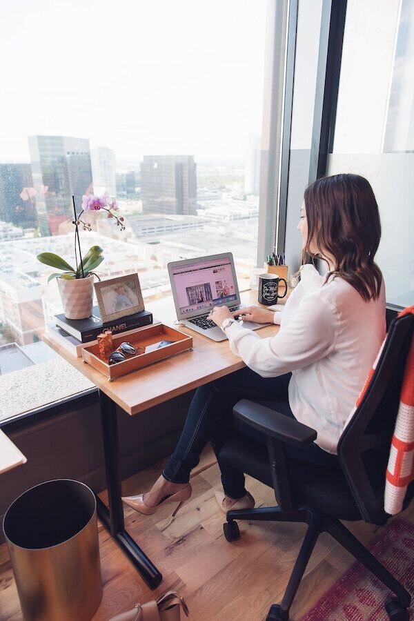 female entrepreneur office desk