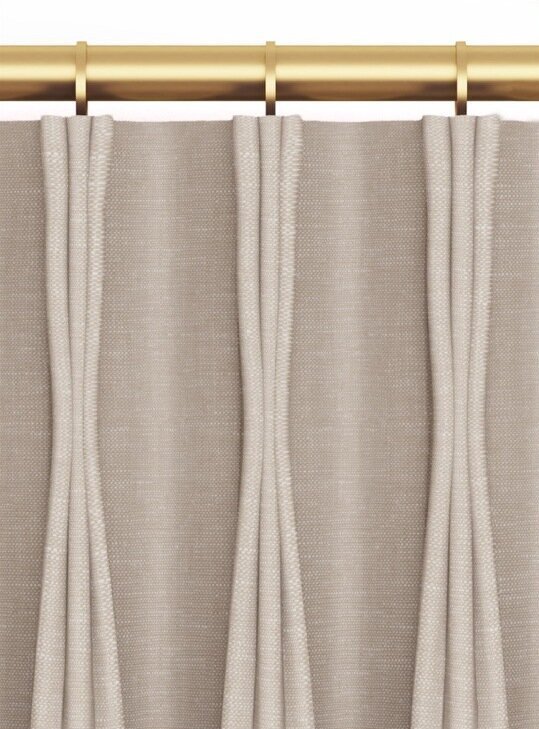 Closeup of a three-finger pinch pleat drapery heading