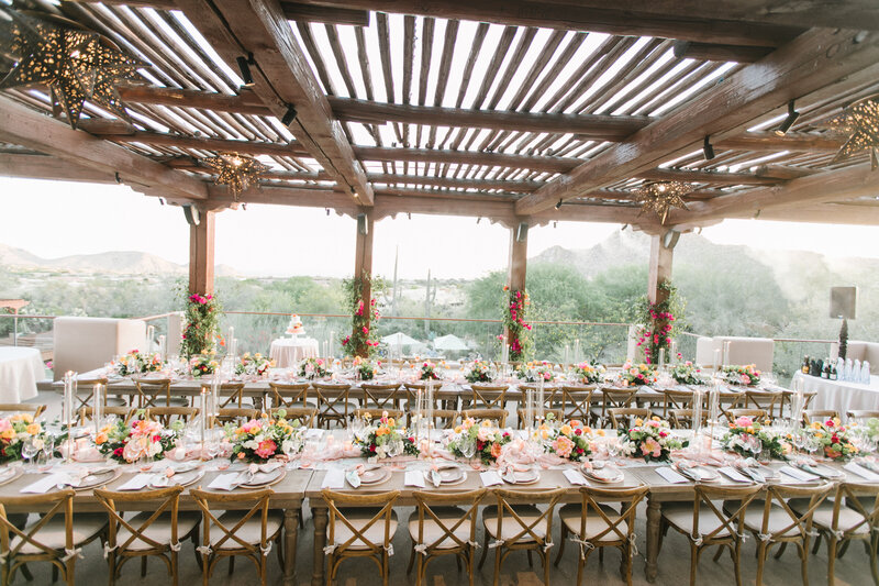 Wedding reception tables with flowers and decor