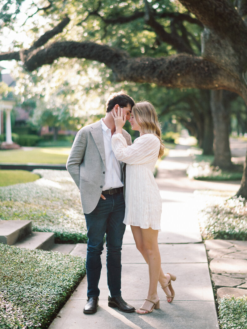 Engaged couple cuddling and in love