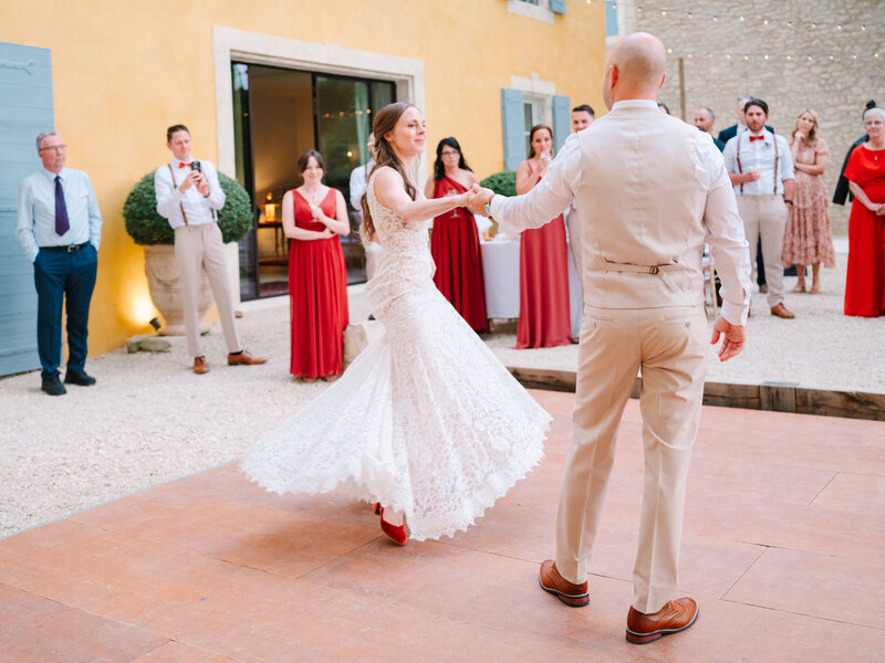 Bride and Groom's First Dance at the Wedding Reception in Front of the Guests