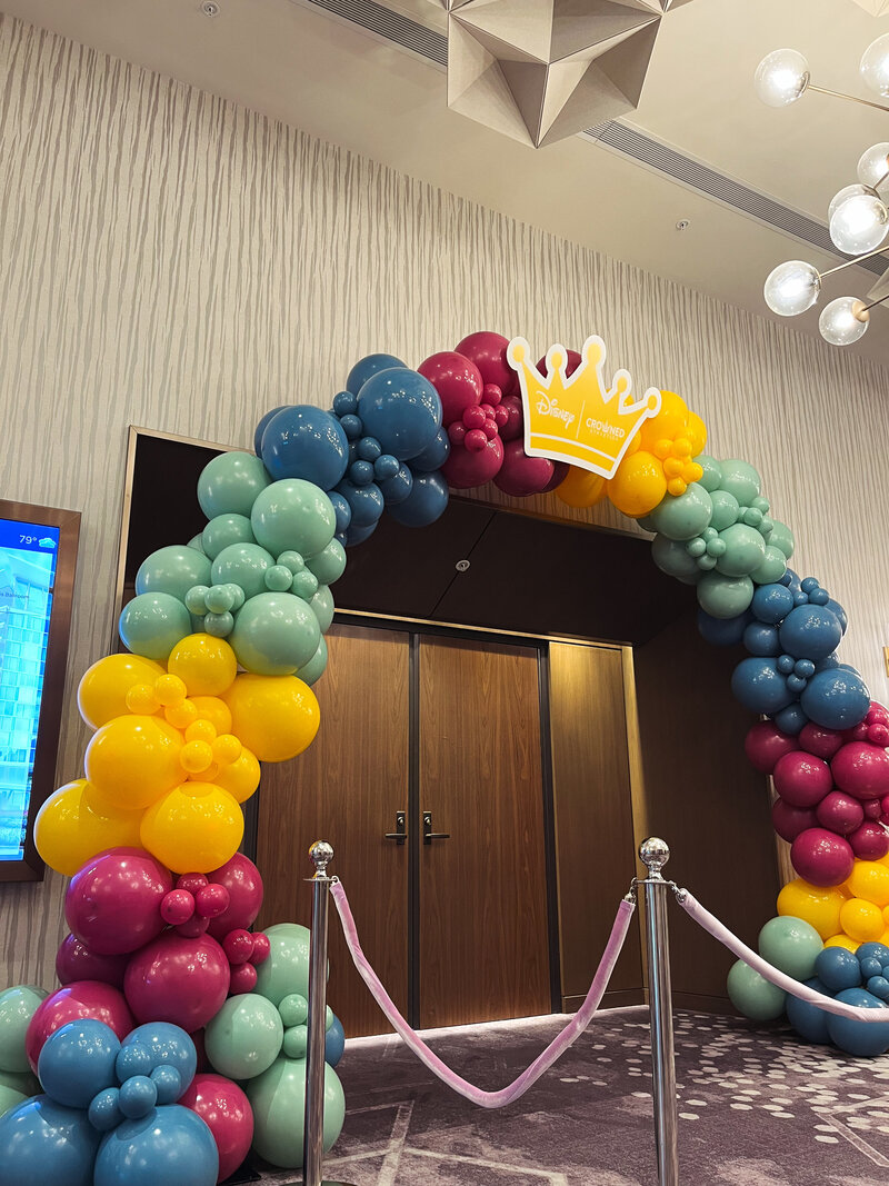 Branded balloon arch and signage for company event Orlando