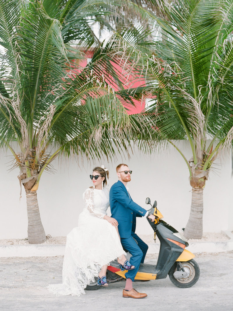 bride-groom-scooter-tropical-wedding-Stephanie-Brauer