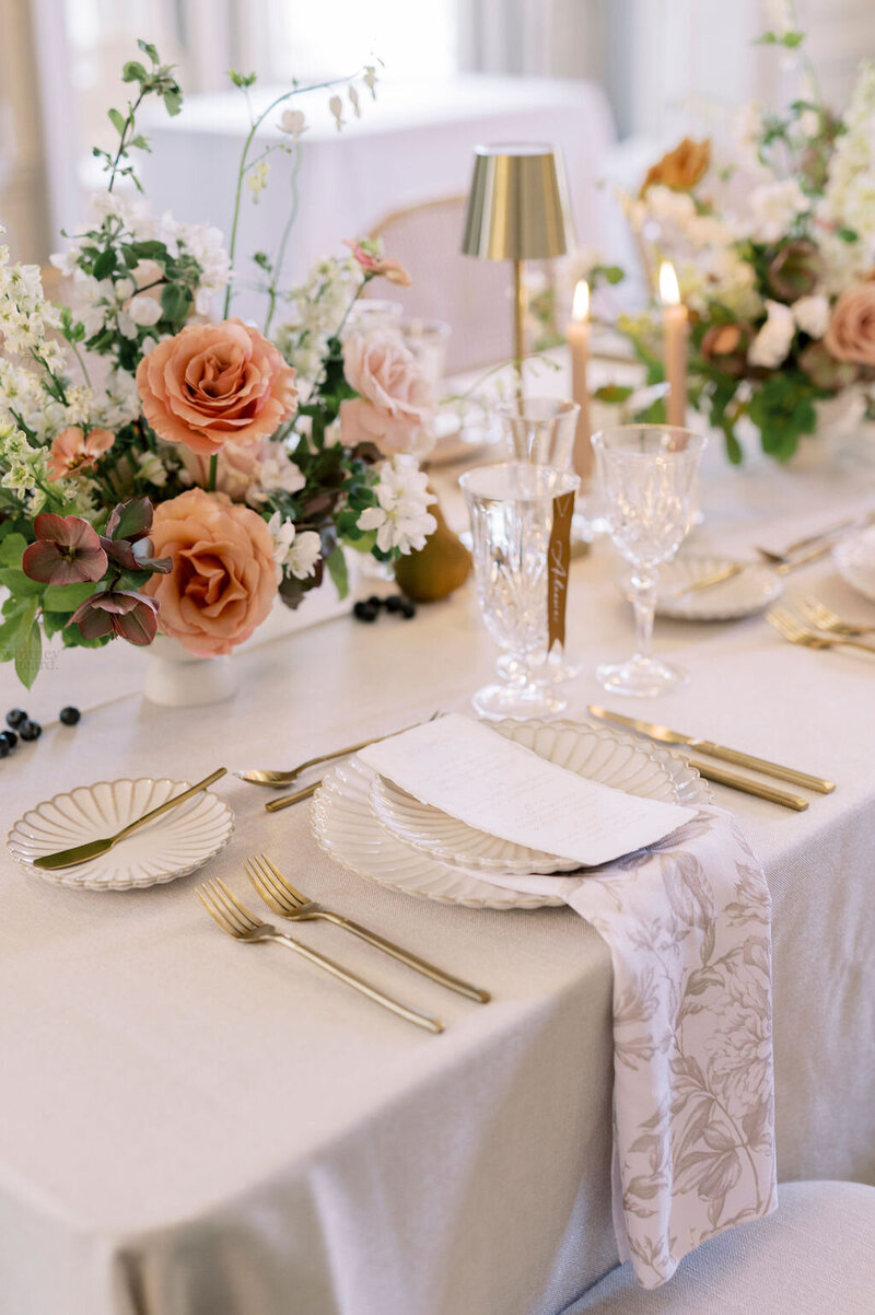 Elegant wedding menu with calligraphy and deckled edges