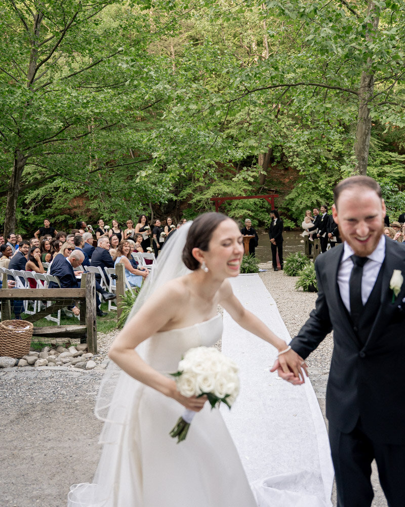 bride and groom portrait in apartment with green wall in Museum area of Philadelphia