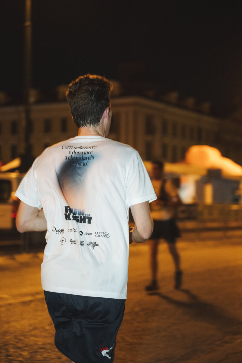 Personal Trainer hanging on fence