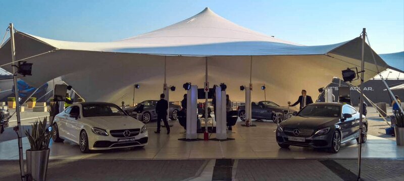 A Pagoda next to a frame marquee being used for an entrance