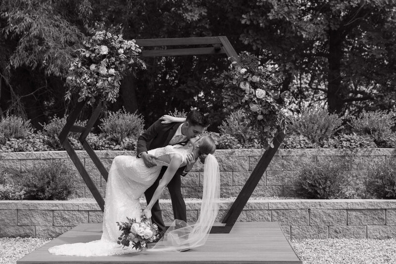An elegant and timeless wedding kiss, where the bride and groom share an intimate moment framed by Idaho’s stunning natural scenery.