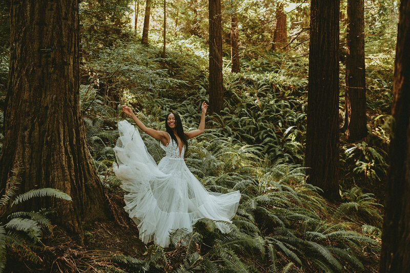 Black bride dancing in Oregon forest