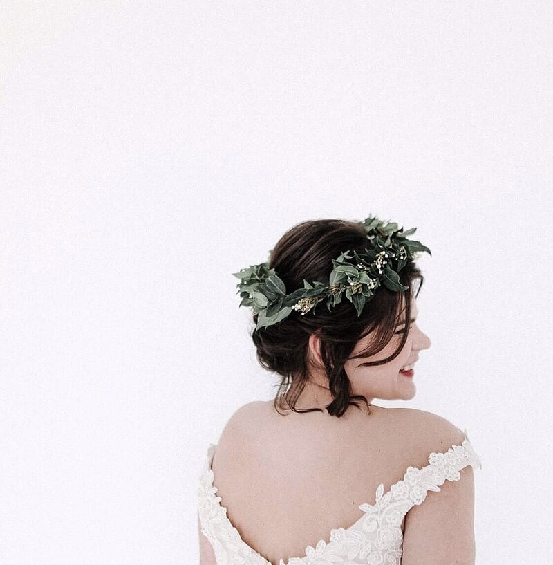A beautiful bride with greenery floral crown by Prose Florals