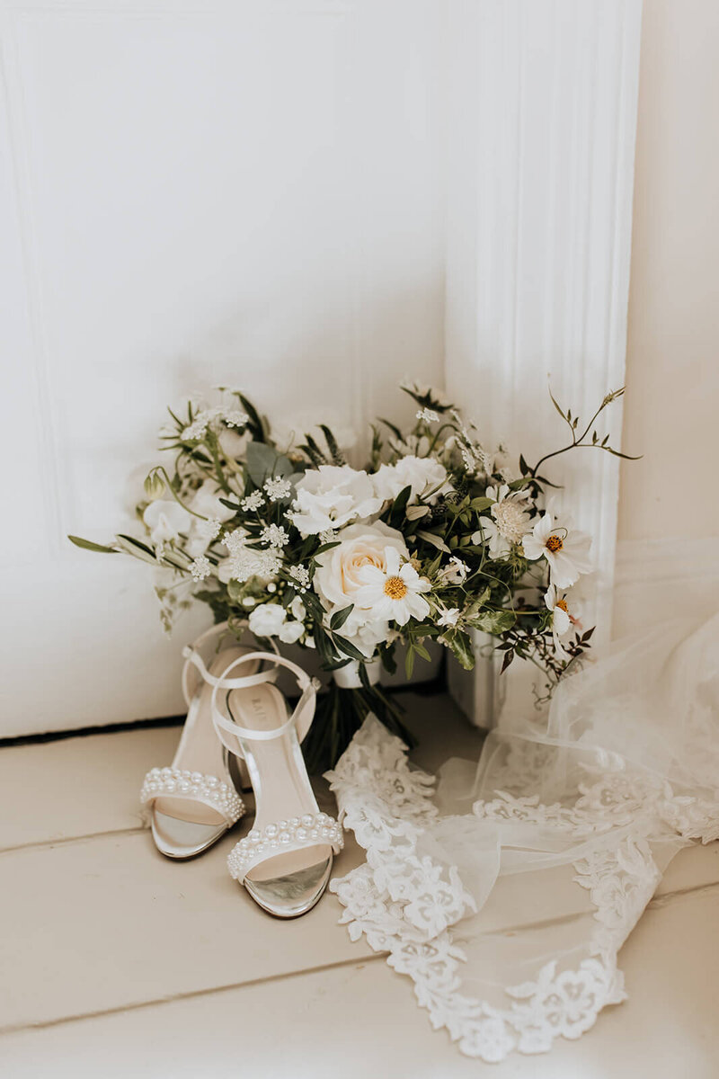 Large glass vase of flowers for Alverton hotel wedding