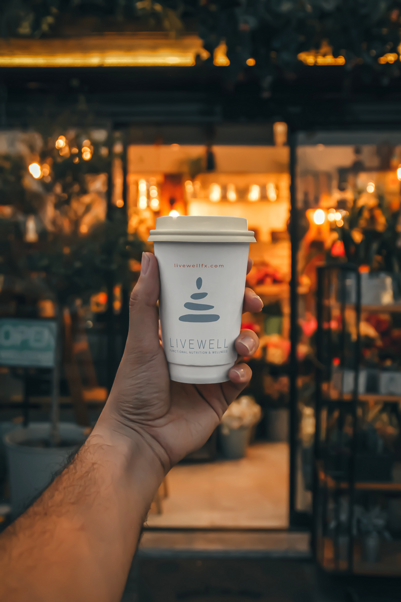coffee cup in hand mockup