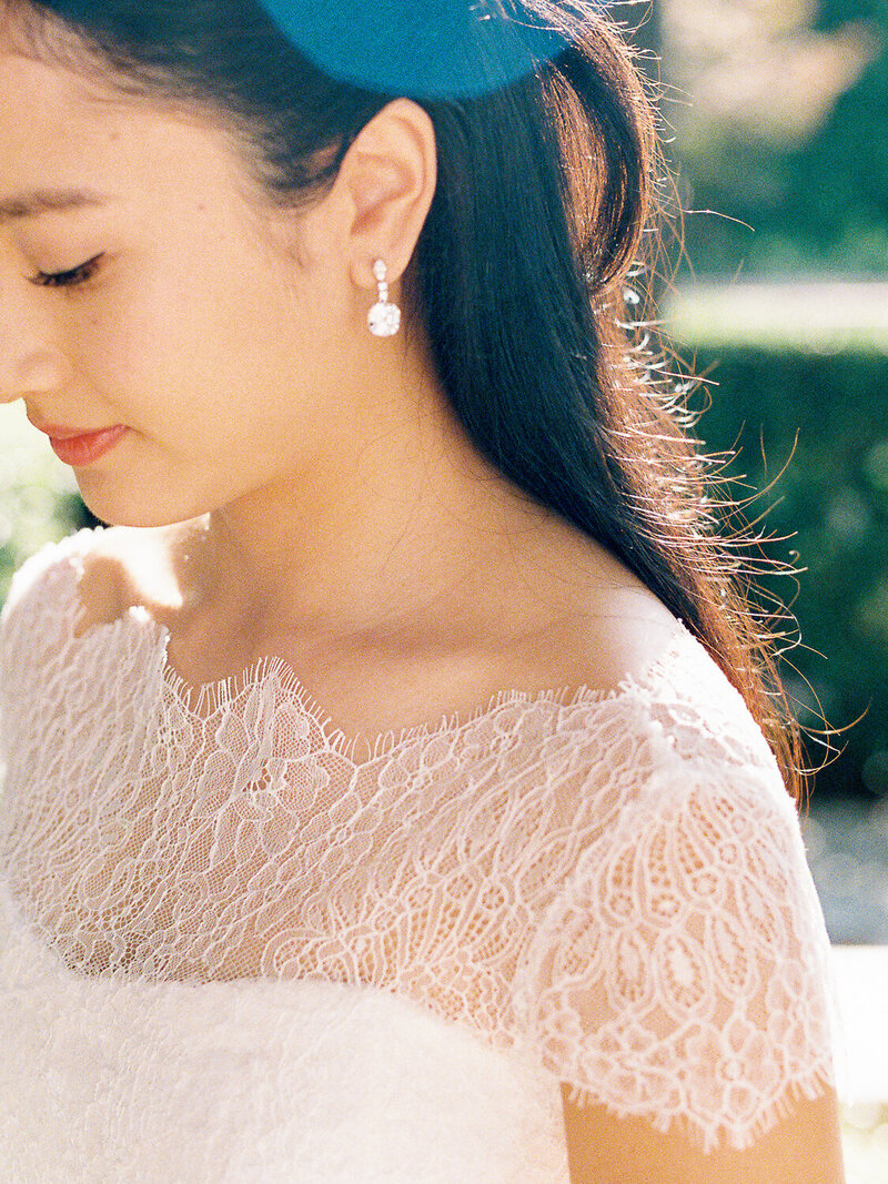 Close up detail of Bride wearing dress