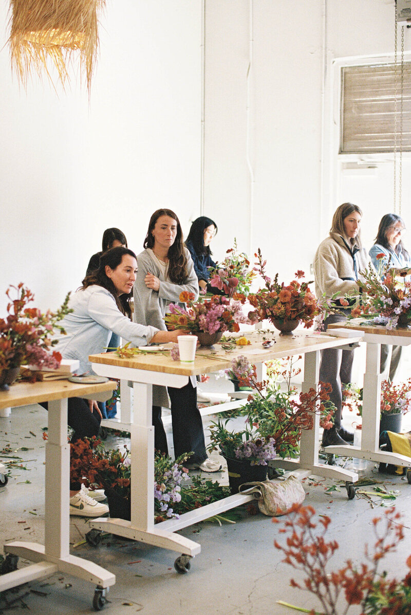 San Diego event florist instructing students in a workshop
