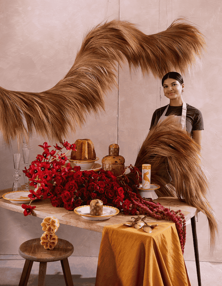 A florist in Montreal arranging flowers in a studio setting, representing professional floral design and everyday bouquet creation.