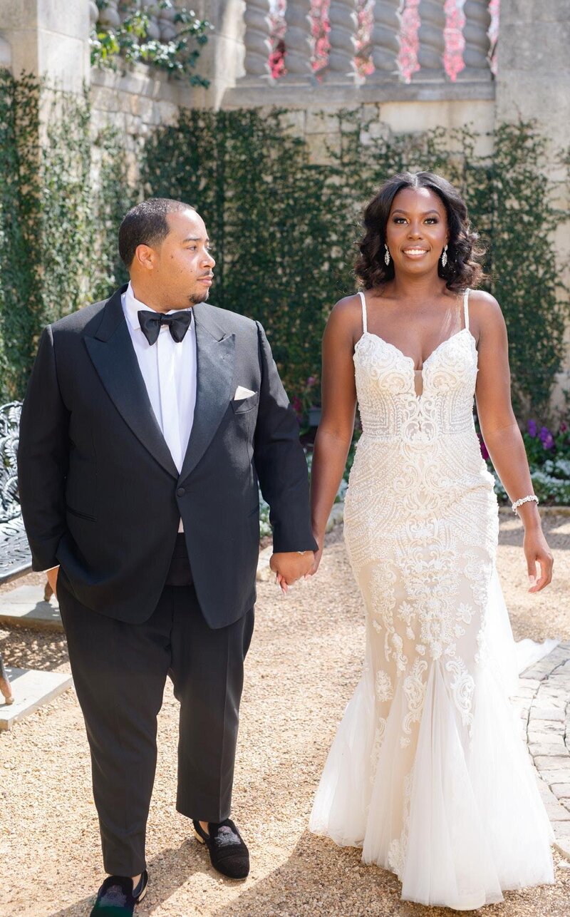 Atlanta wedding planner, Tyler Albritton, and her husband pose for a wedding portrait during their wedding at the Dallas Arboretum & Botanical Gardens