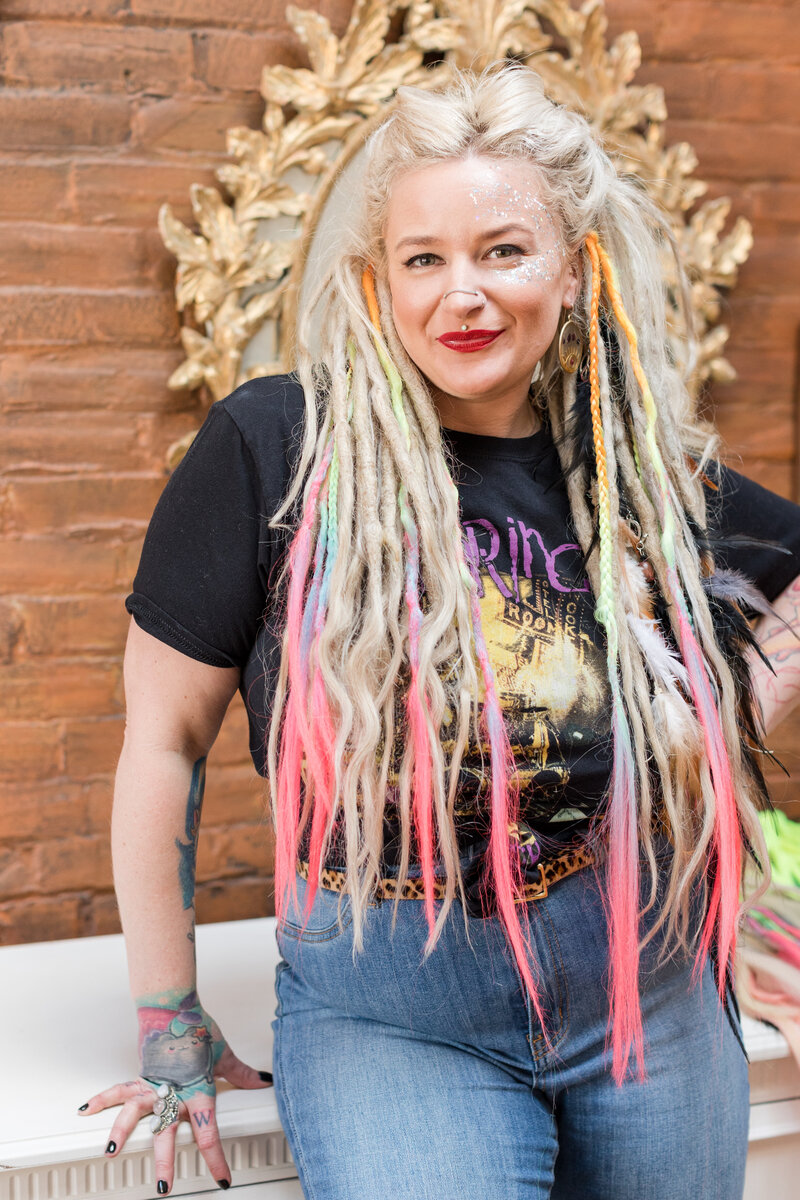 At Let Me Live Locs, we're more than just a dreadlock studio - we're a community of like-minded individuals who share a passion for unique and creative style. Join our community and let Erica and her team help you express yourself through your dreadlocks