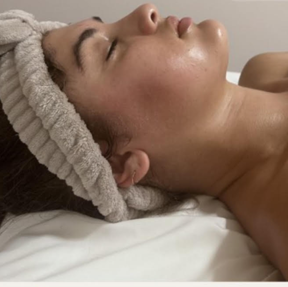 A women after she had a face lymphatic drainage massage