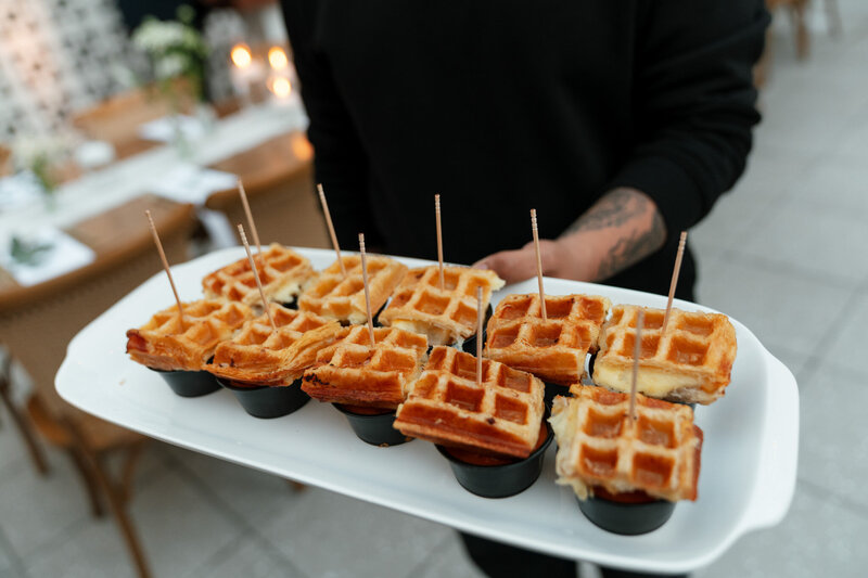 Hart and Main's Twist on the Classic Breakfast Treat: small skewered sections of waffle with Syrup dipping cups. perfect for a sweet treat while staying clean 