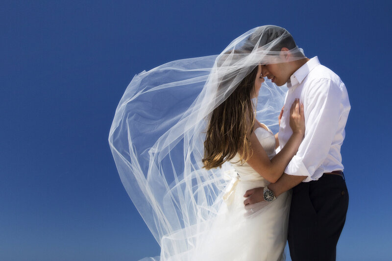 Whitsunday Wedding Elopement Whitehaven Beach photography couple in love with veil.