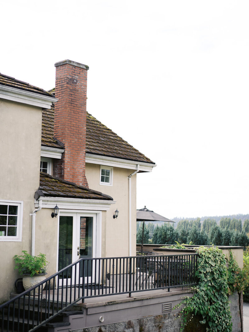 cozy terrace with elegant outdoor seating and views of the surrounding serene landscapes