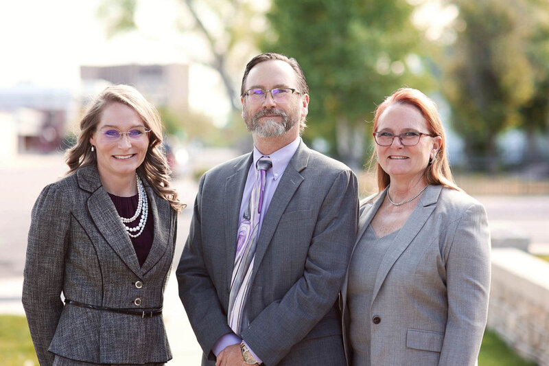 Wyoming attorneys from Bennett Law Group outside their office