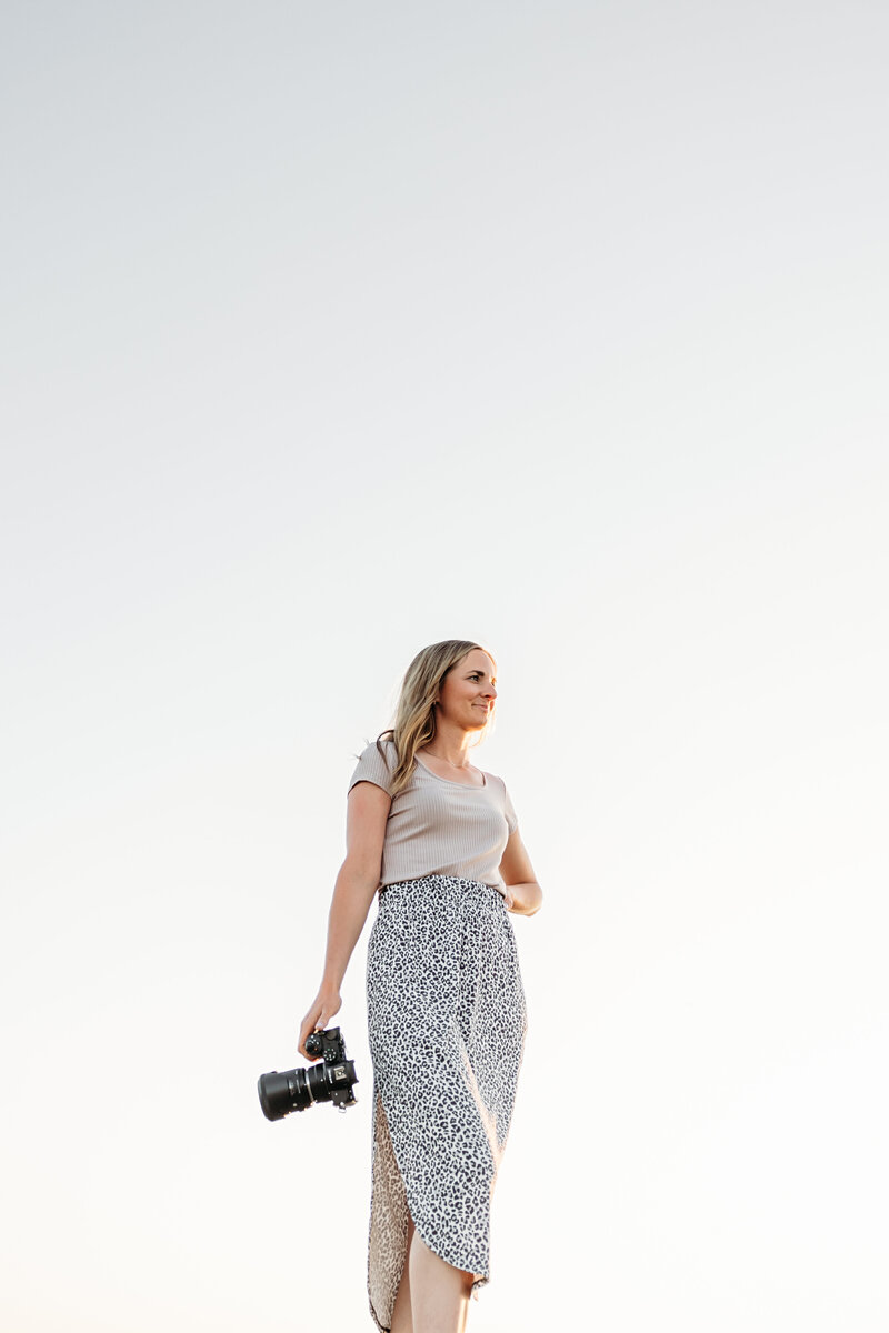 Portrait of Mandy with the sky behind her