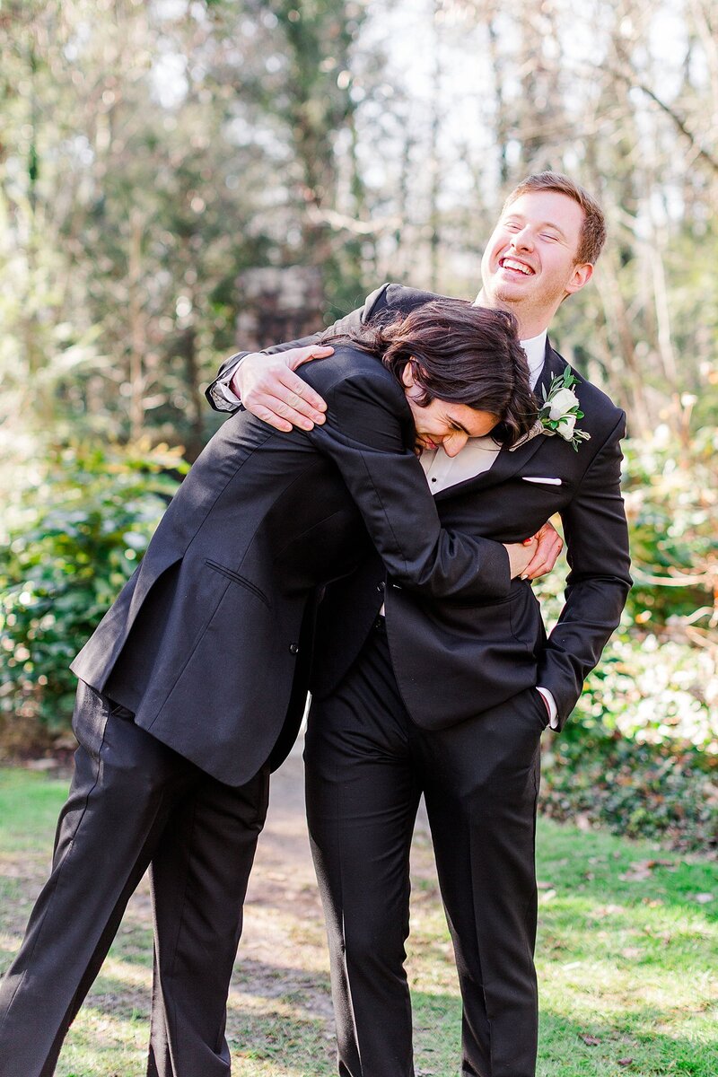 groom and groomsman goofing around by Knoxville Wedding Photographer, Amanda May Photos