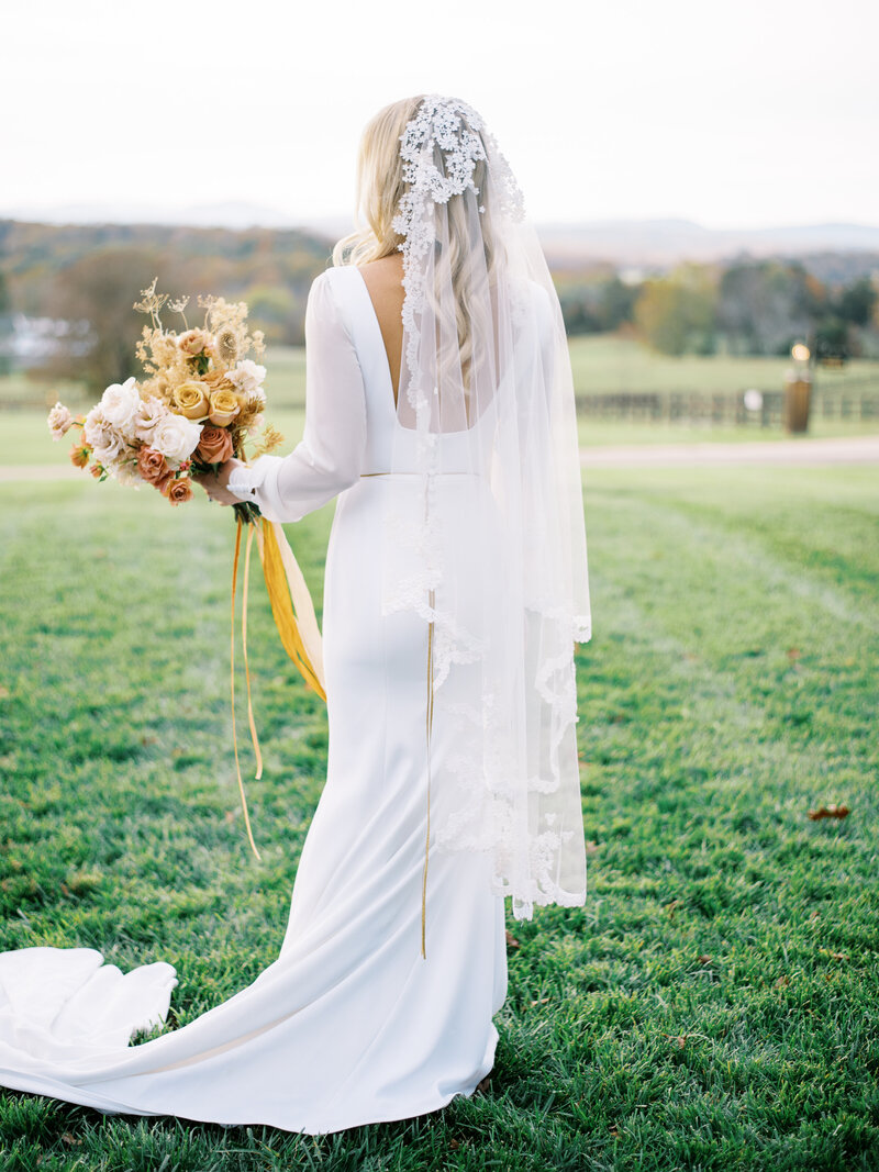 Bride turned with veil