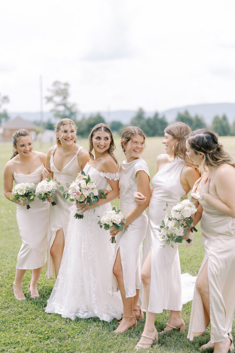 Bridal party stands together at outdoor ceremony in central PA