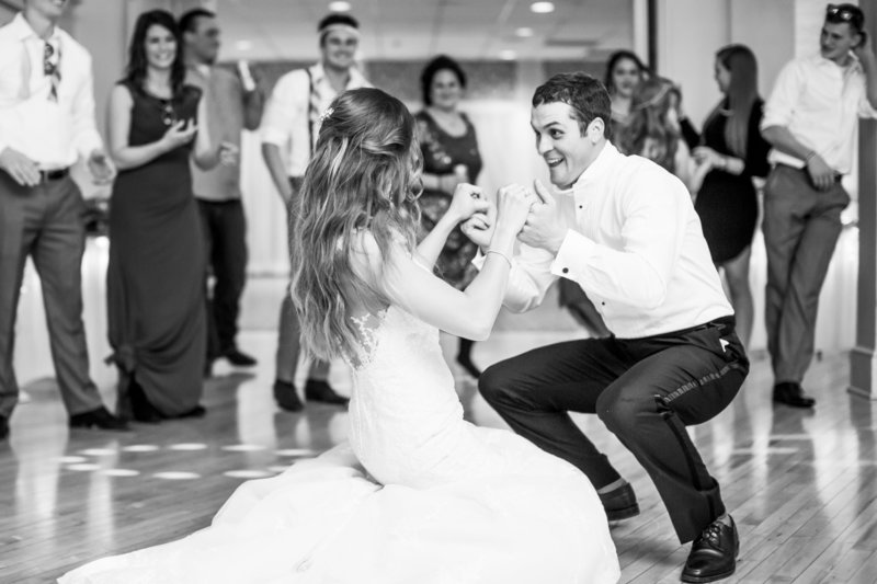 Couple dancing at wedding reception.