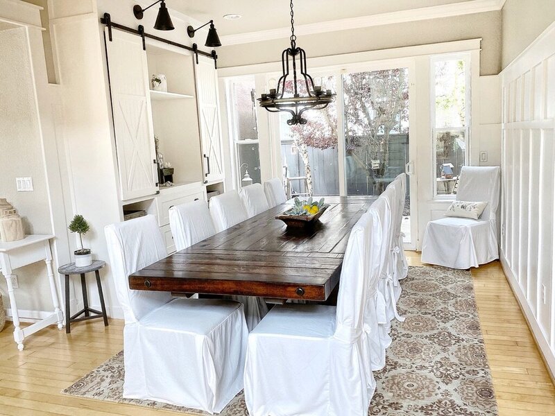 dining room with built in and table and sherwin williams accessible beige paint and sherwin williams pure white