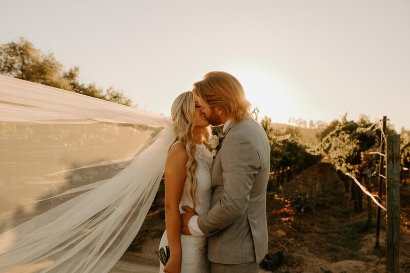 bride and groom kissing