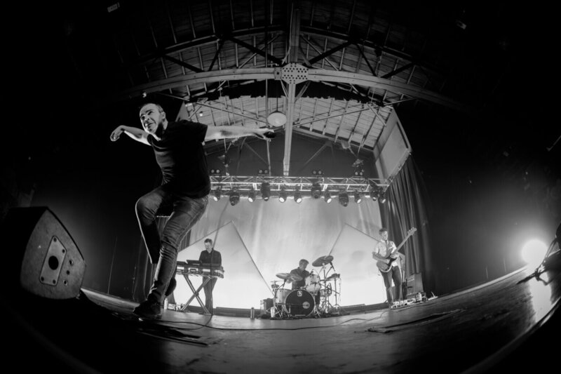 North Carolina photographer, Future Islands captures a image of the band Future Islands in Asheville, North Carolina. 