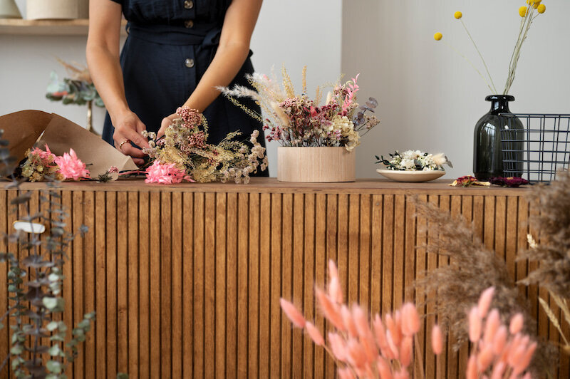 front-view-woman-working-with-flowers
