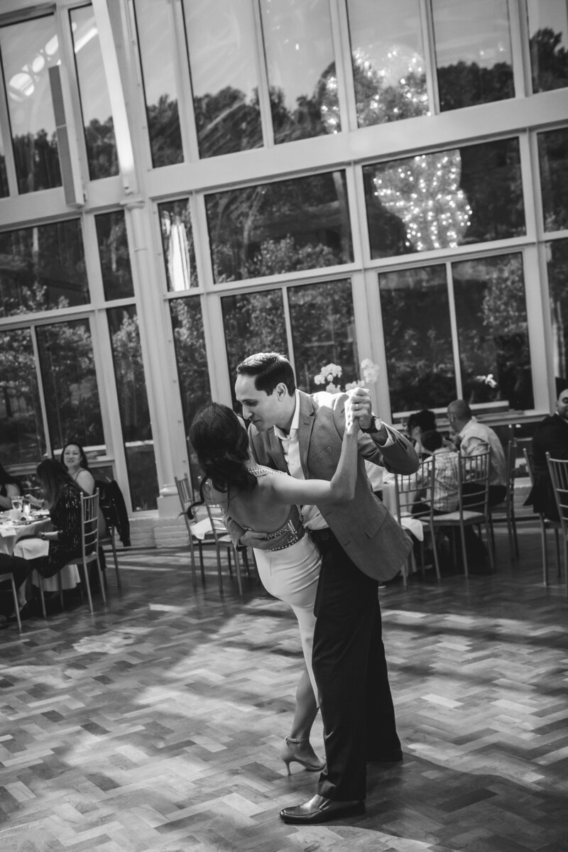 Dramatic dip during a dance at a formal birthday gala.