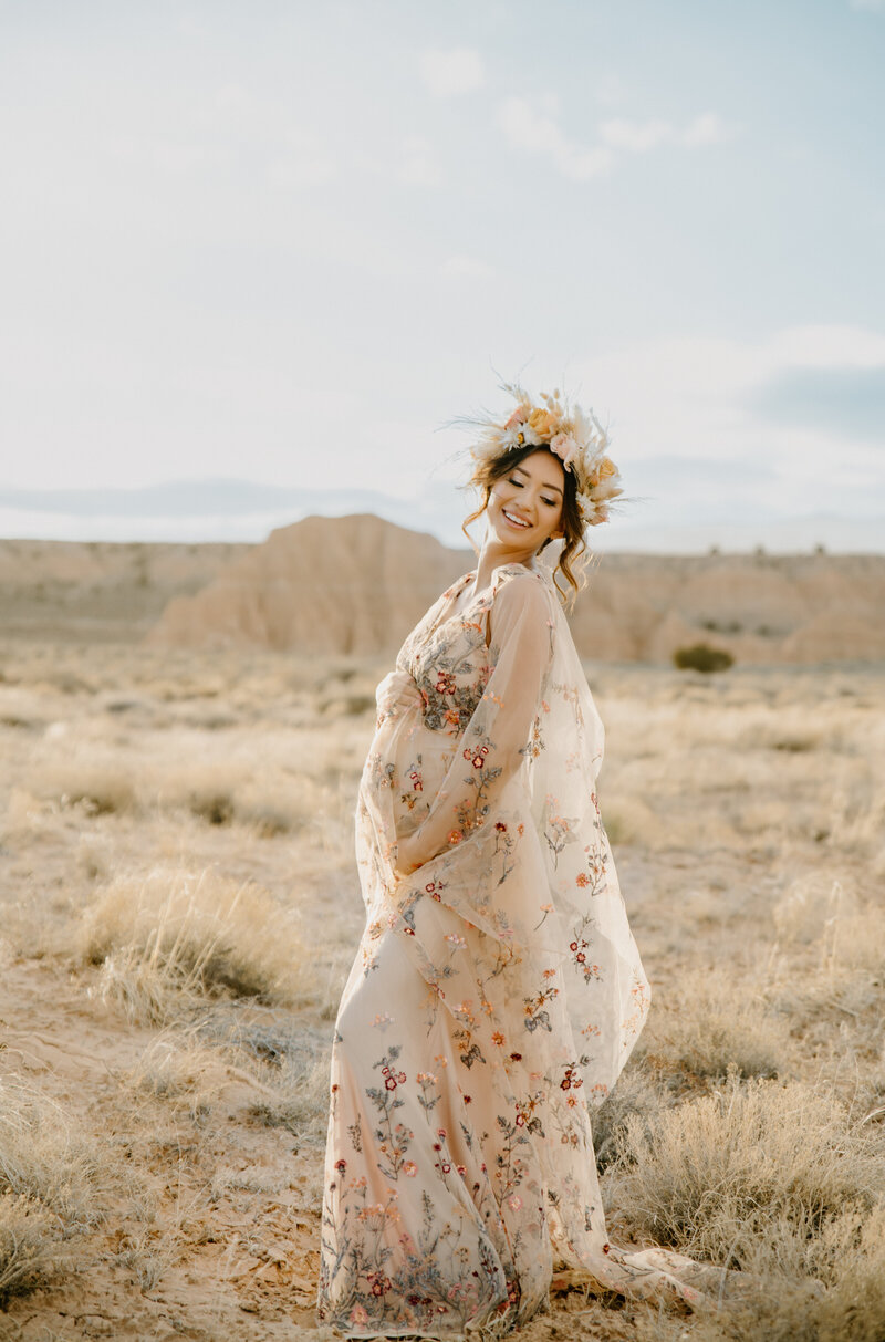 mom to be in a pink gown