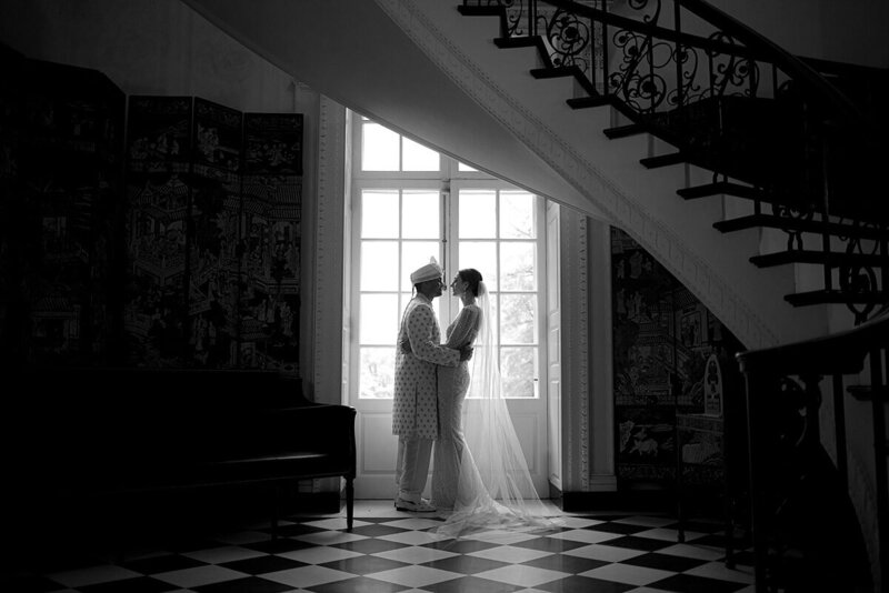 Couple embracing before their wedding at the Swan House in Atlanta