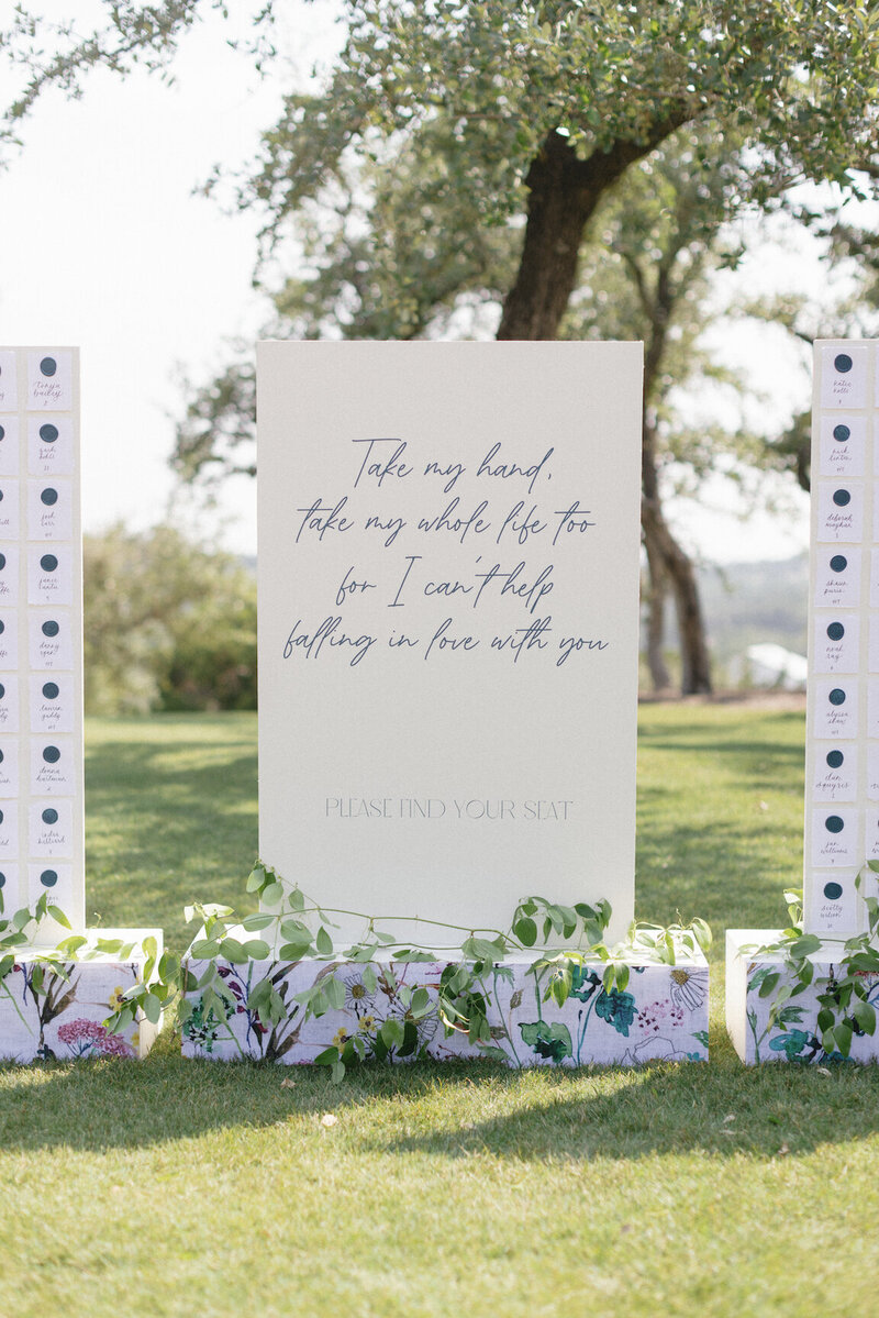Reception decor in Canyonwood Ridge hall with romantic lighting and Hill Country details