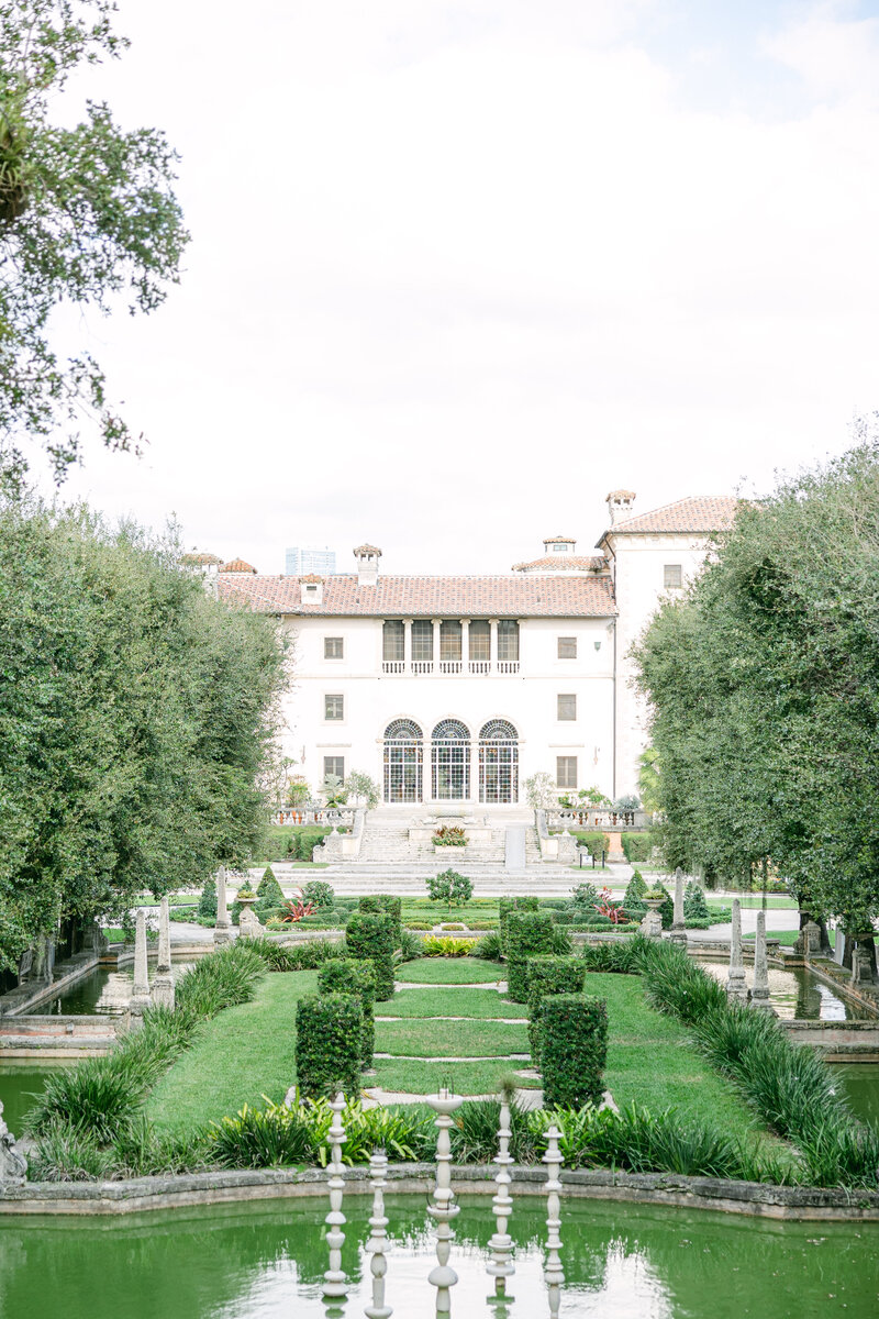 The stunning gardens and historic architecture of Vizcaya Museum in Miami, a luxury wedding venue known for its European-inspired elegance and timeless charm.