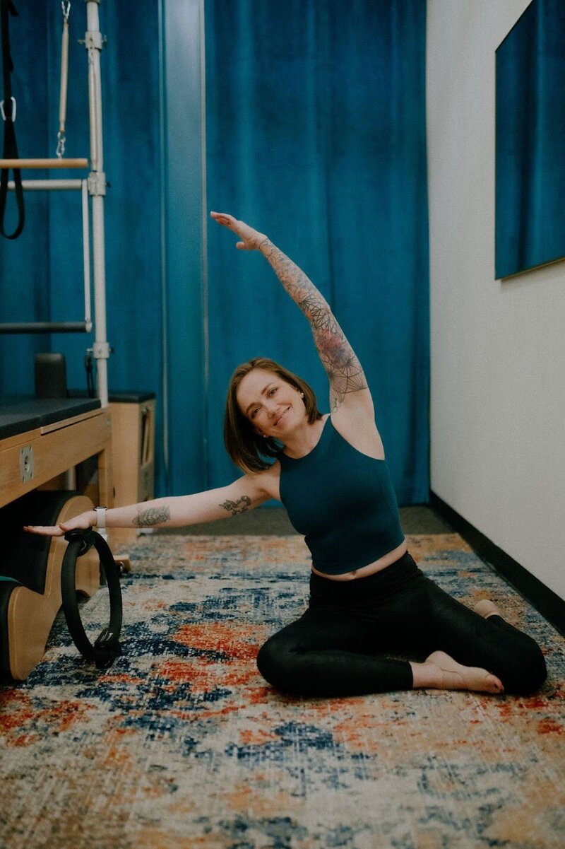 Brittany Landefeld is owner and instructor at Powerhaus Pilates sitting in Powell Ohio