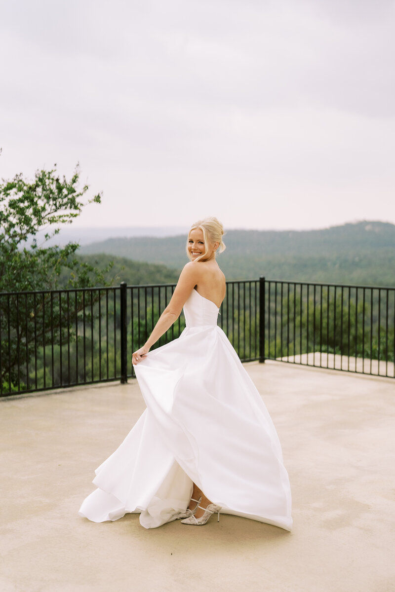 Bride twirling in wedding dress