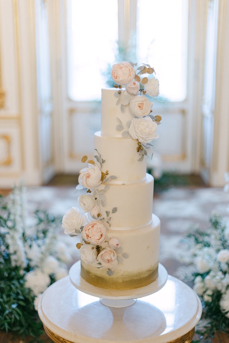 Luxury bespoke wedding cake with hand made sugar flowers at destination wedding in Palace Coburg Vienna