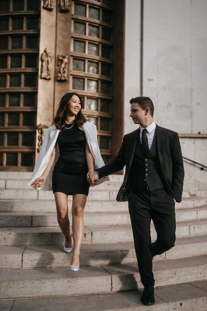 Elegant engagement portraits in Palais Royal garden in Paris