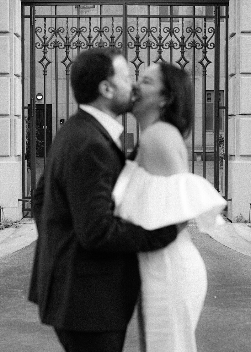 Bride and groom walk up memorial steps at their DC wedding