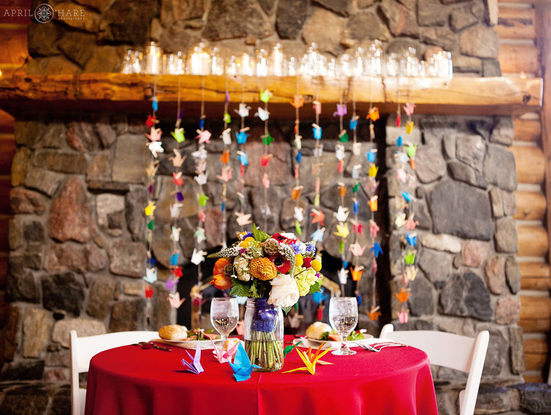 Bright and colorful rainbow wedding decor for a hawaiian inspired wedding at the Evergreen Lake House