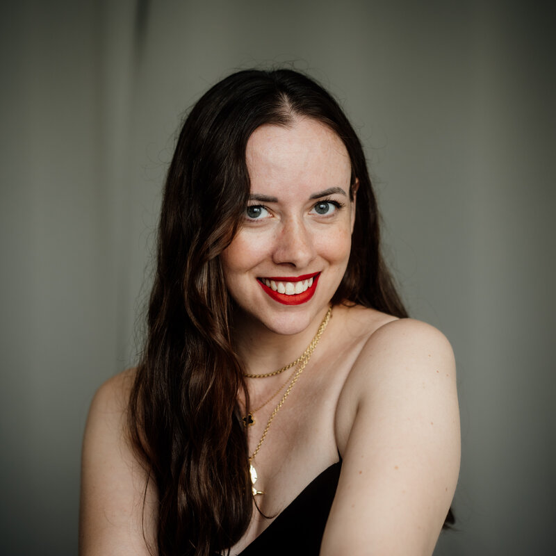 professional headshot arms crossed