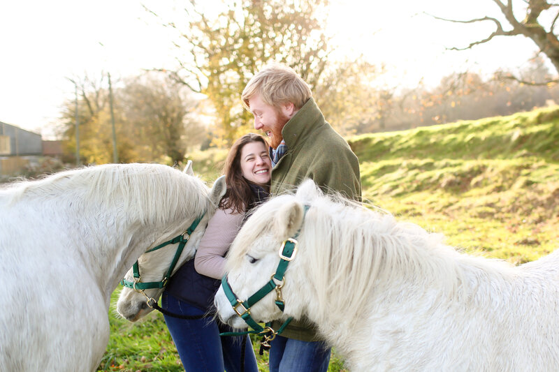 engagement-shoot-in-surrey-by-leslie-choucard-photography-couple-with-horses