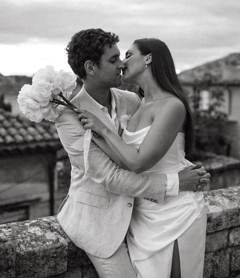 Gorgeous couple kissing in a village in Provence