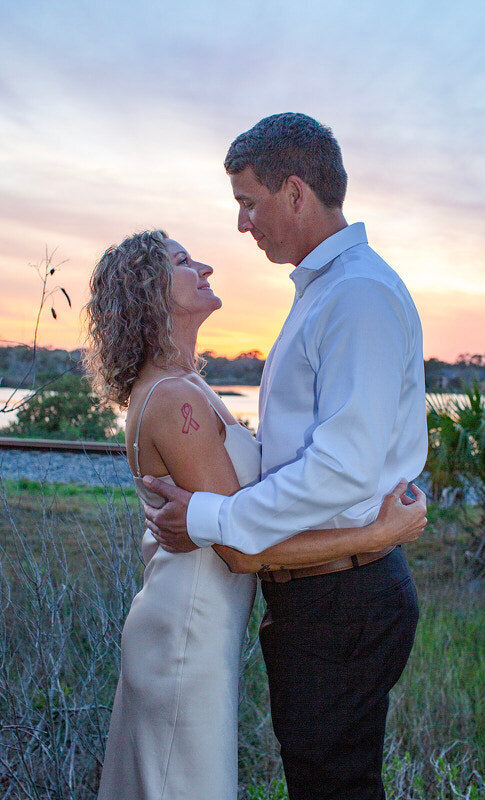 Sunset capture in a St Augustine field during golden hour engagement